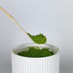 Bamboo Scoop of Ceremonial matcha to prepare Matcha Latte
