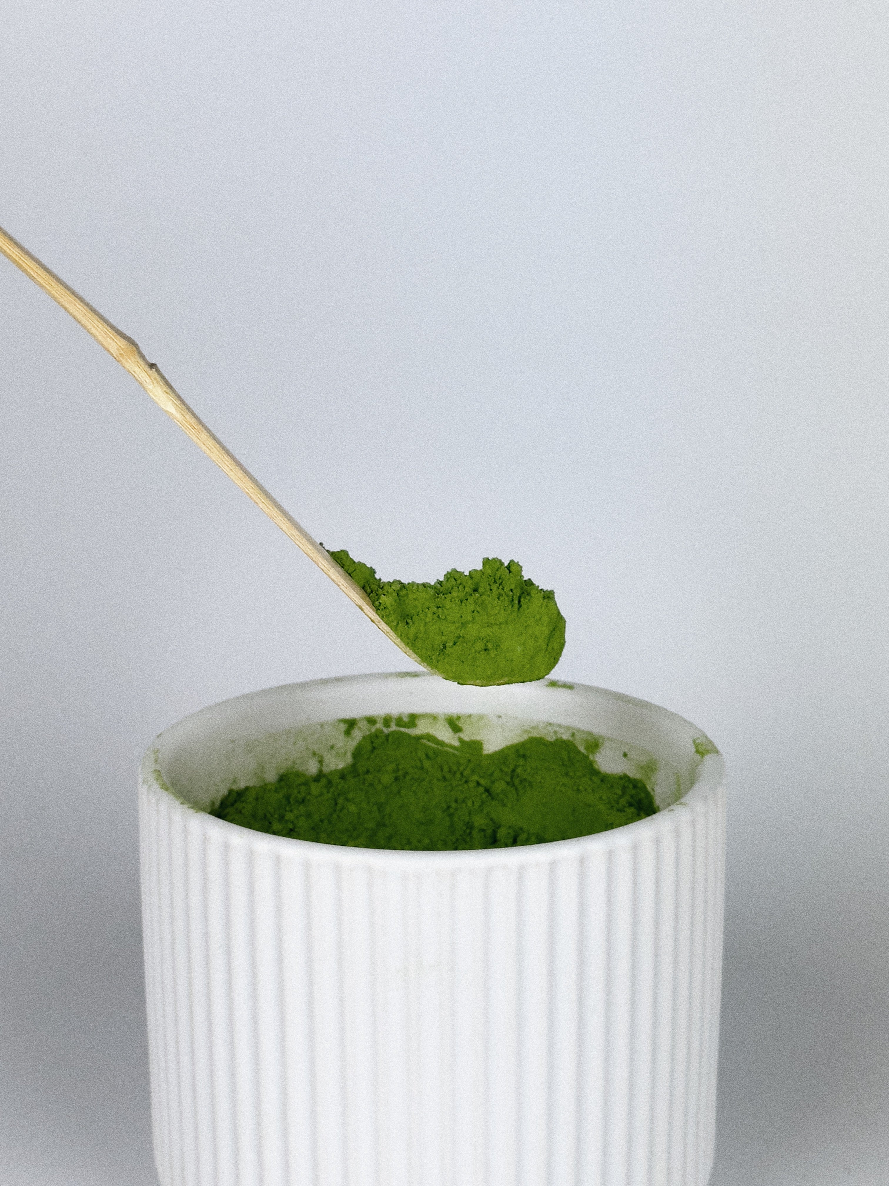Bamboo Scoop of Ceremonial matcha to prepare Matcha Latte