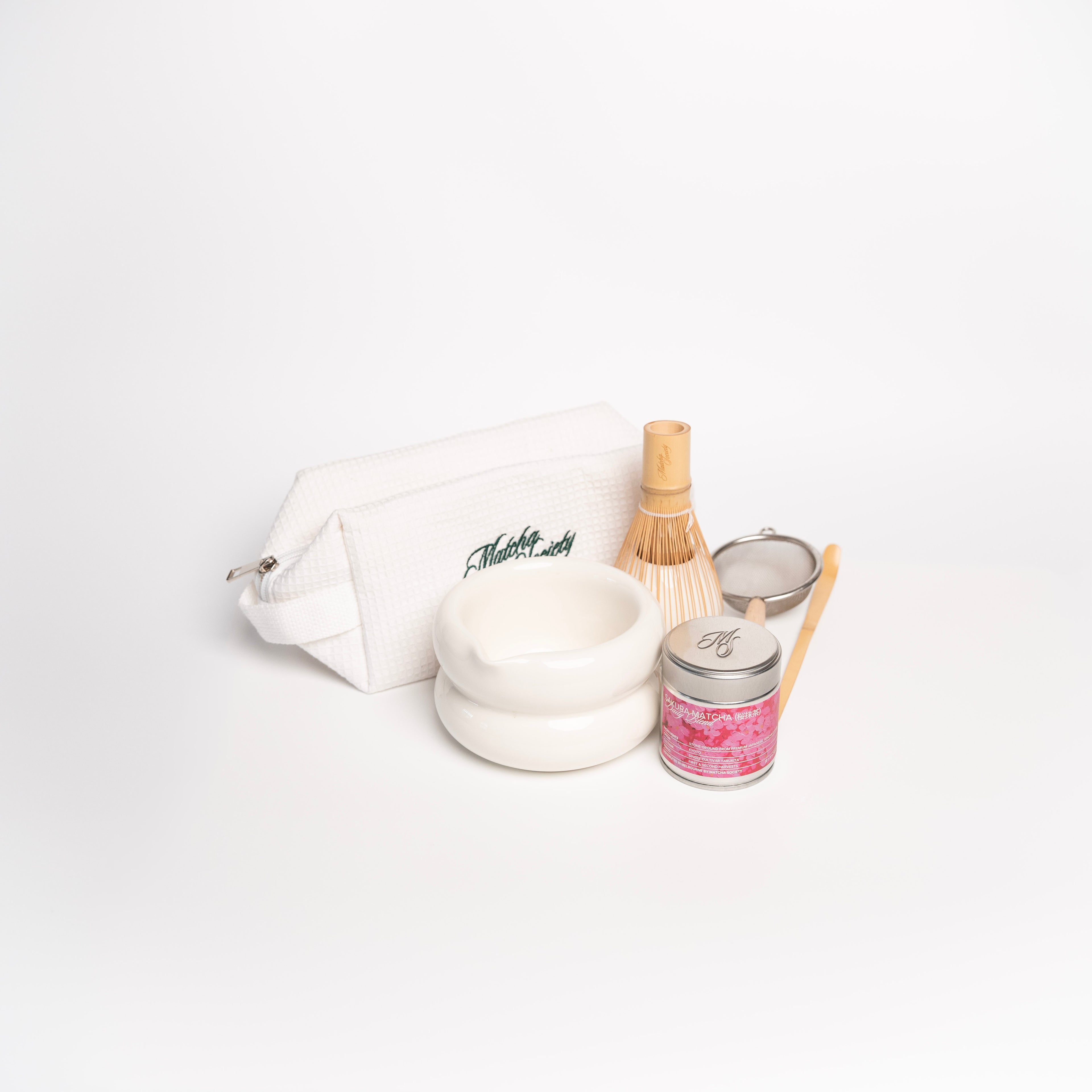 Matcha Society Valentine’s toiletry bag with sakura matcha and matcha tools, styled as a curated gift set